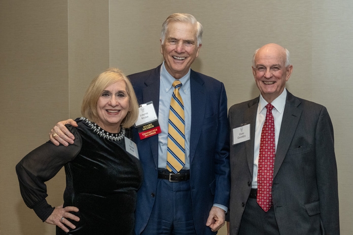 ] Texas Appleseed Board Member and Partner at Norton Rose Fulbright, Layne Kruse, at the Good Apple Dinner with his wife, Gayle Kruse, and Gary Goolsby, Senior Managing Director at FTI Consulting. November 15, 2023.