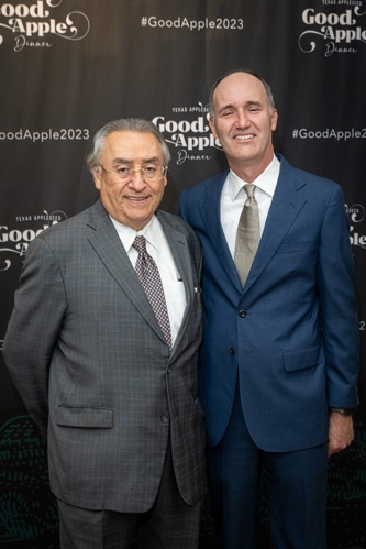 Two guests attend the 2023 Good Apple Dinner.