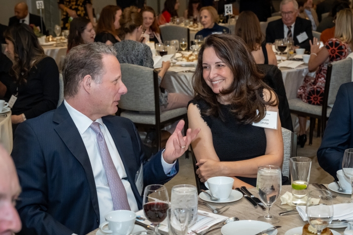 People talking at the Good Apple Dinner