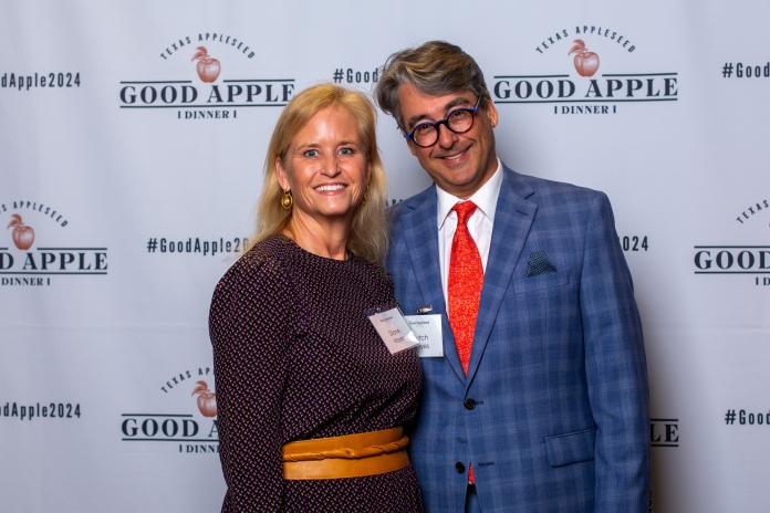 People smiling at the Good Apple Dinner