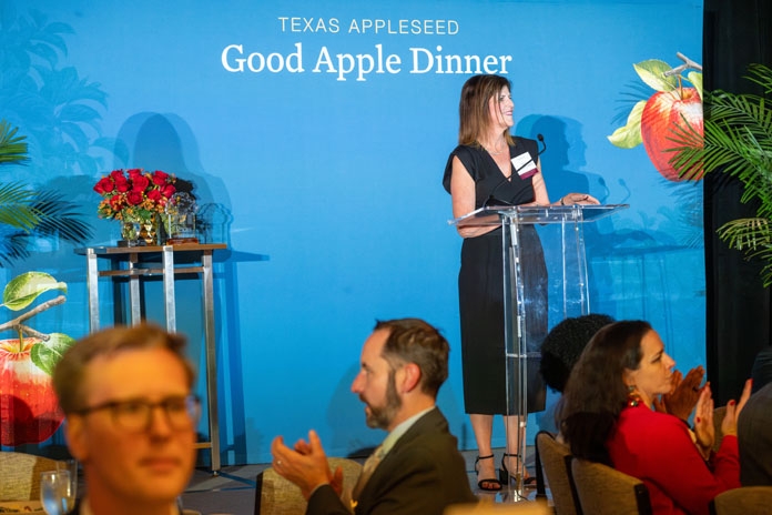 Gina DeBottis Motts speaking at the Good Apple Dinner