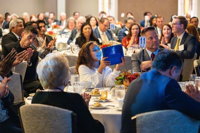People attending the Good Apple Dinner